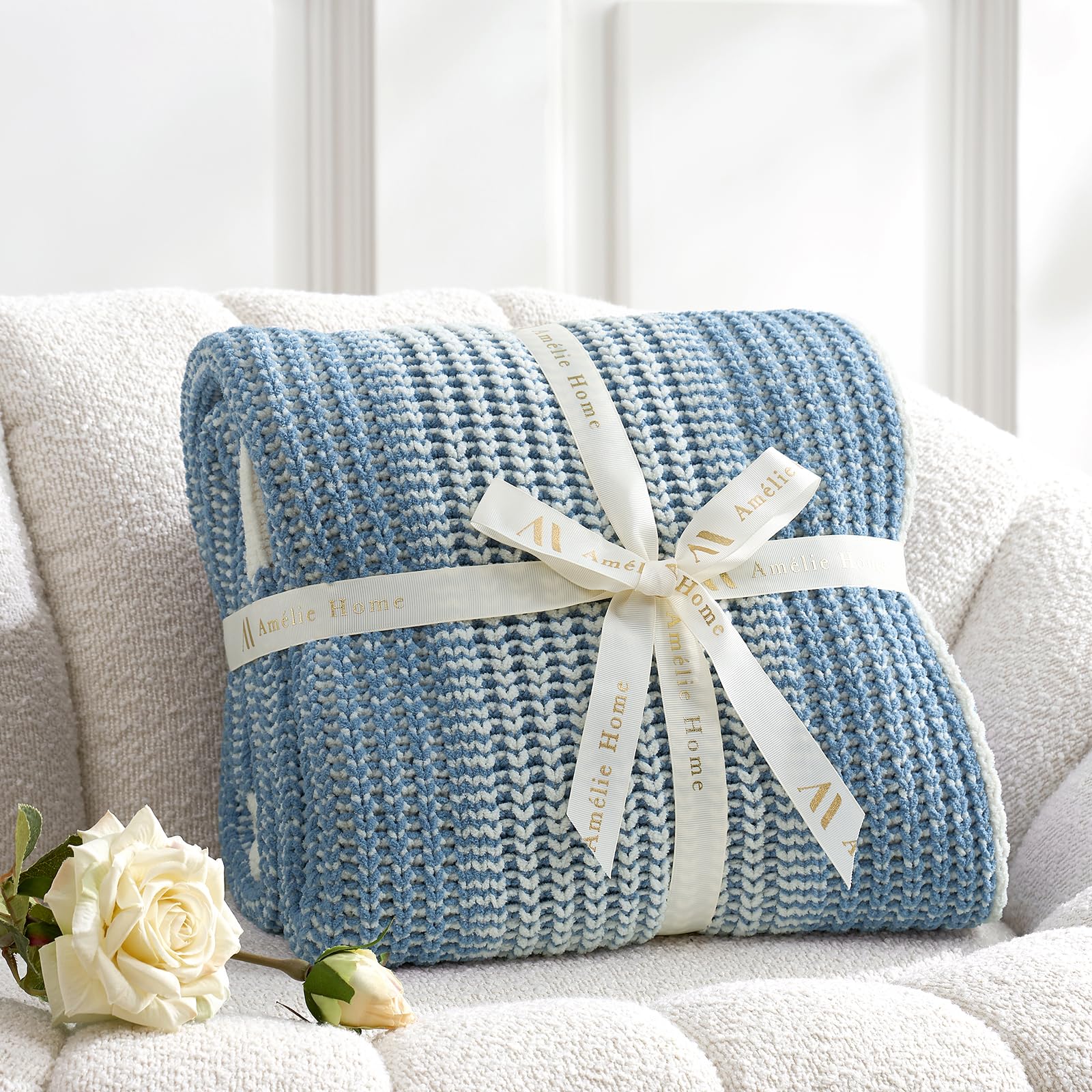Amélie Home throw layered at bed foot for a cozy look