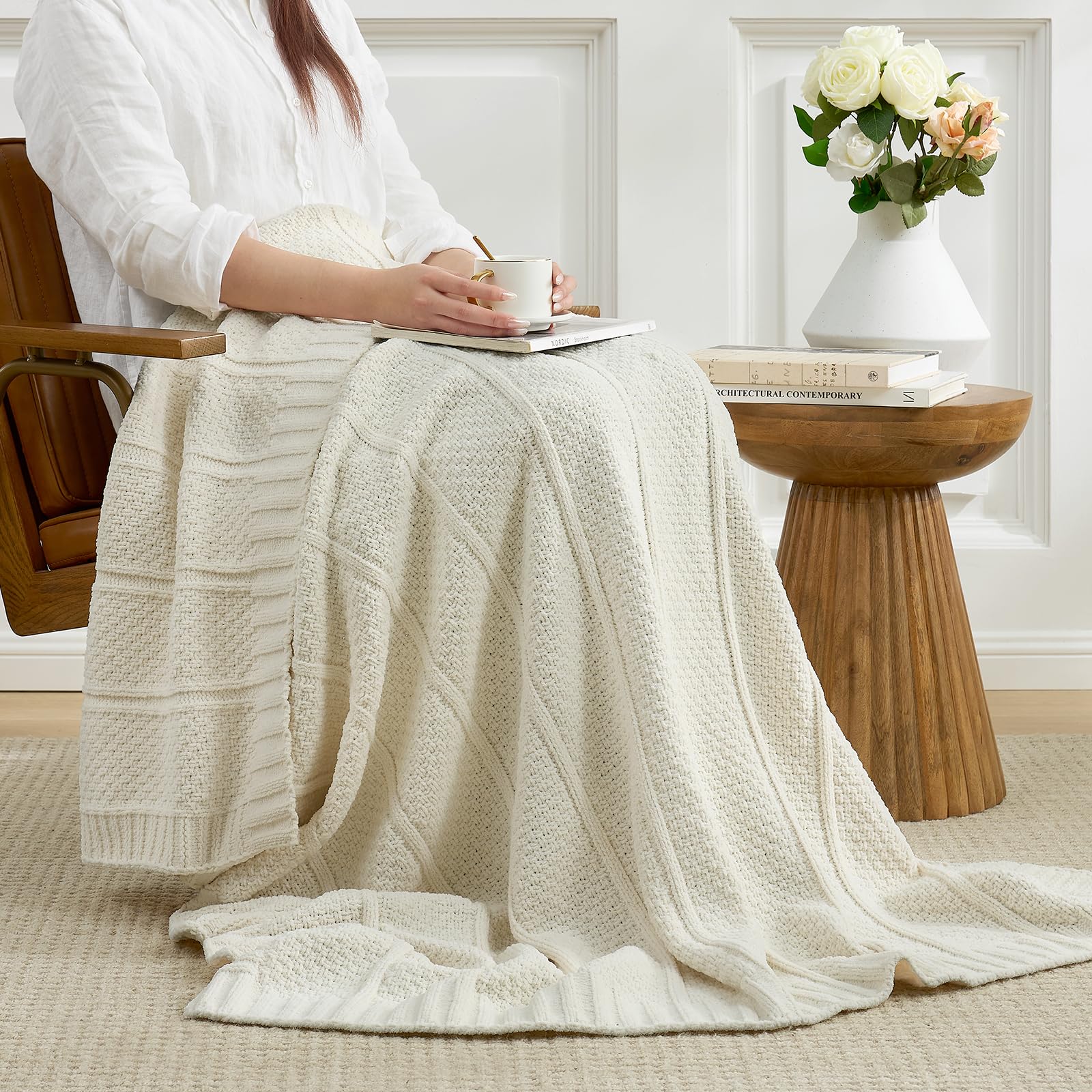 Amélie Home throw layered at bed foot for extra warmth and style.
