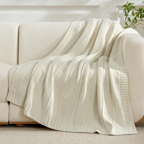Amélie Home chenille throw draped on sofa adds cozy ambiance.