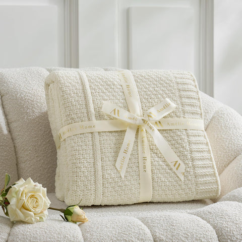 Amélie Home throw's durable knit resists pilling for long-lasting care.