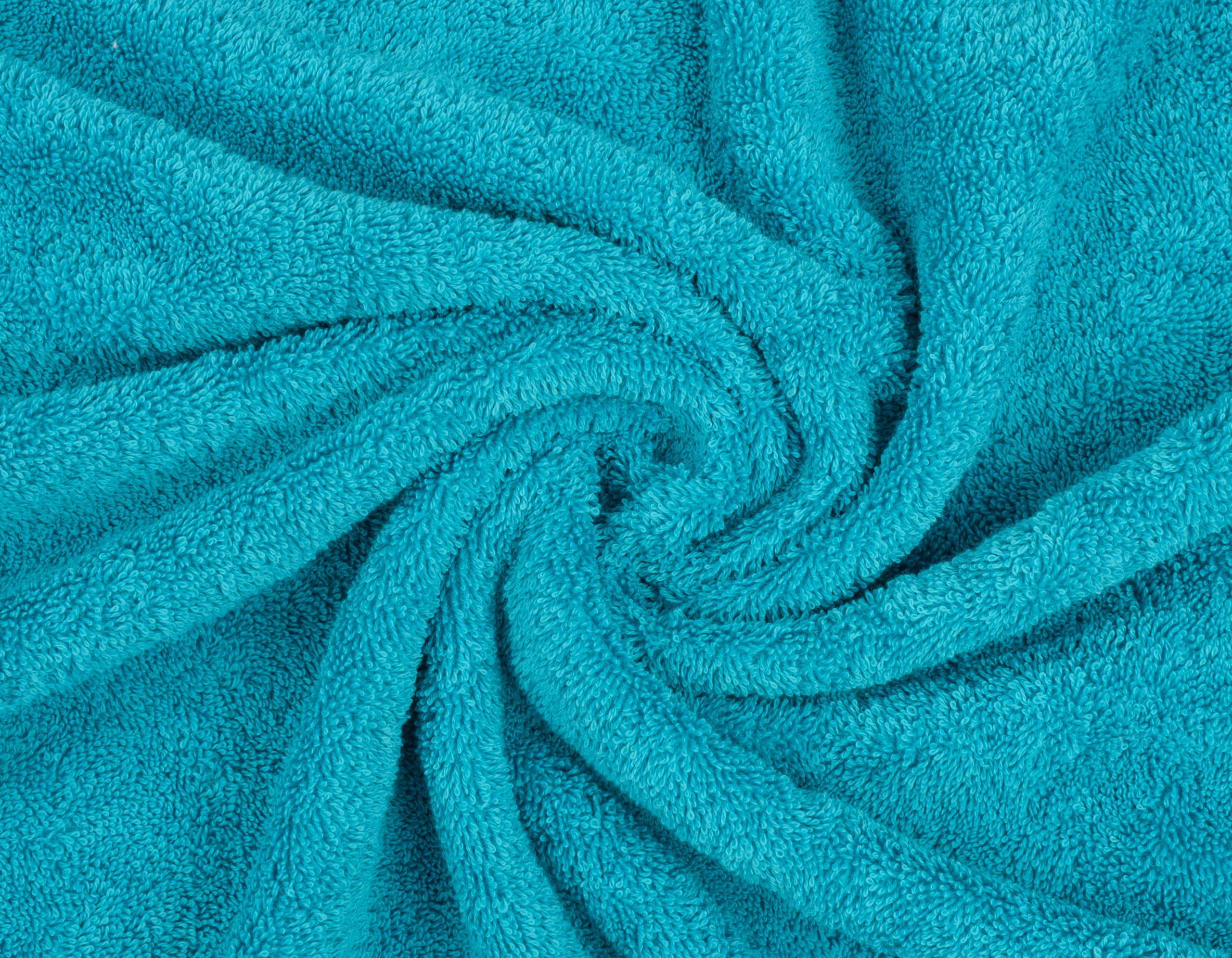 Close-up shows 600 GSM plush Turkish cotton texture.