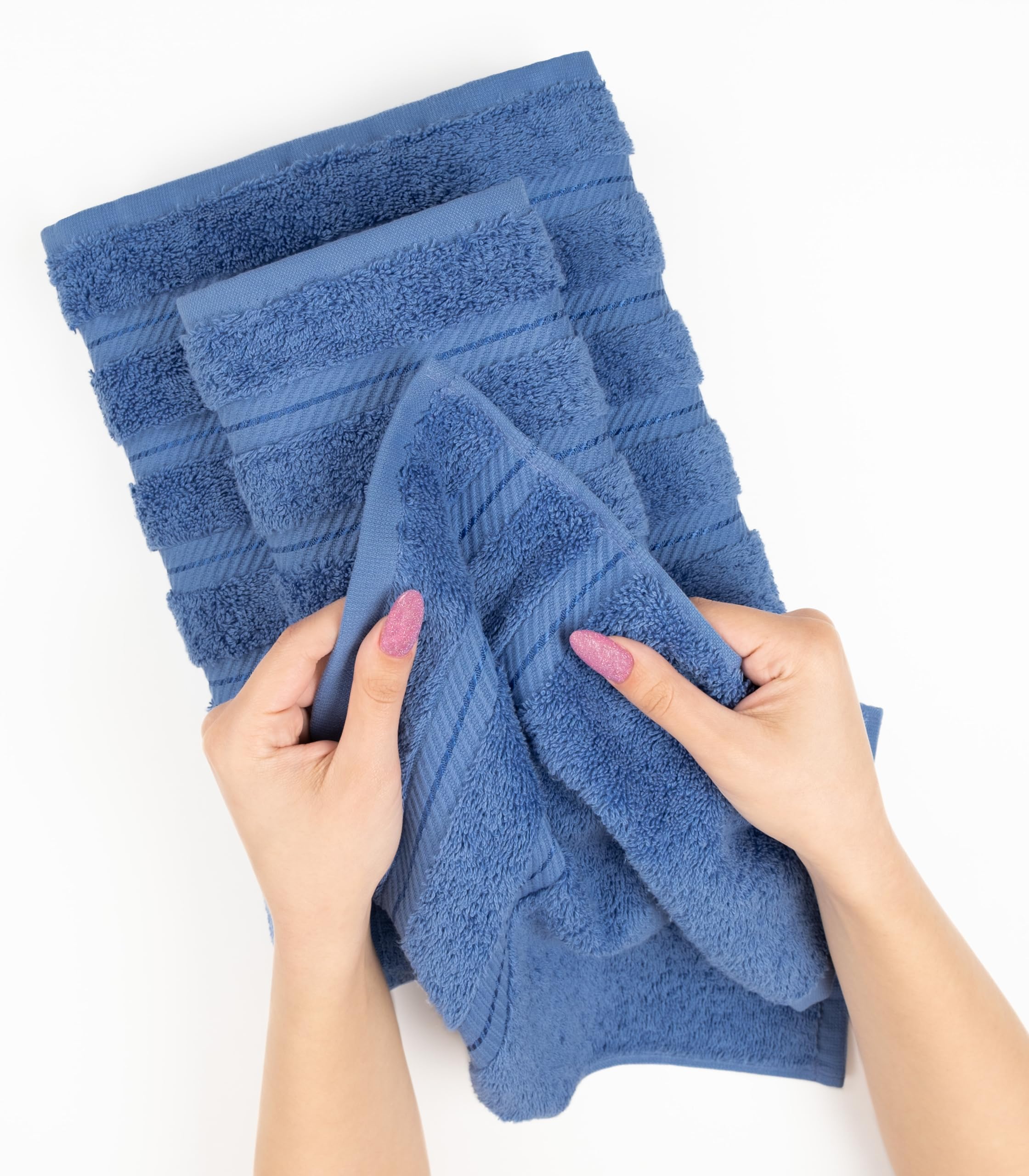 American Soft Linen four-piece bathroom towel set in electric blue for coordinated decor