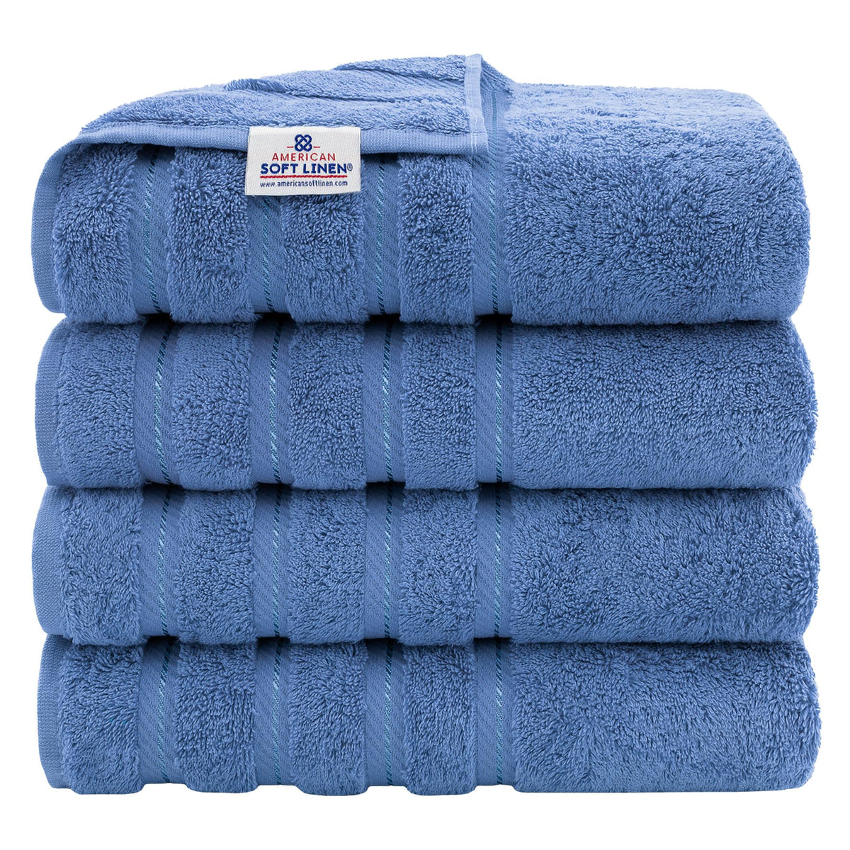 American Soft Linen electric blue 4-piece set on a rack, showcasing large 27x54 towels.
