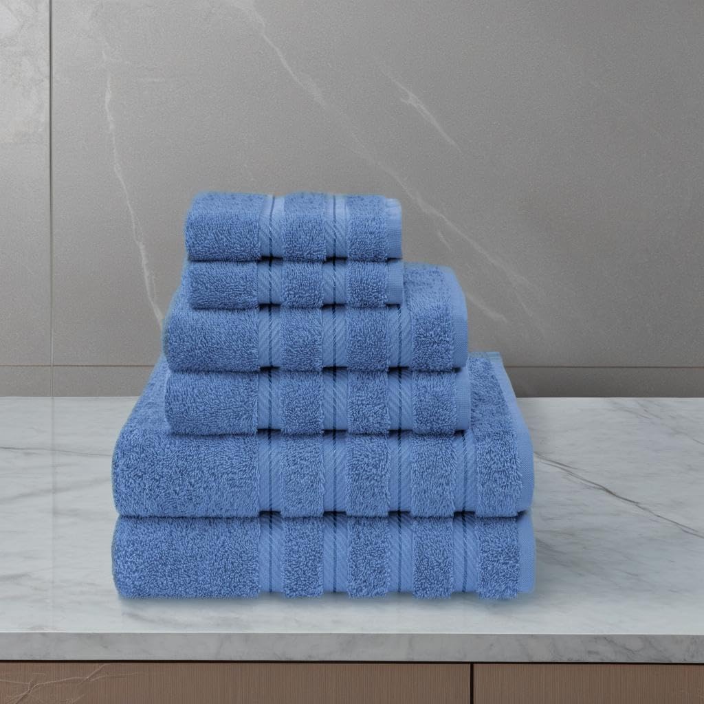 American Soft Linen electric blue towels on a rack highlight 600 GSM thickness.