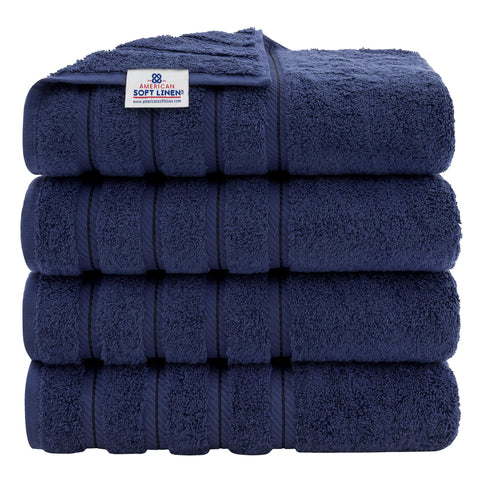 American Soft Linen luxury 4-piece bath towel set in navy for spa-like comfort after shower