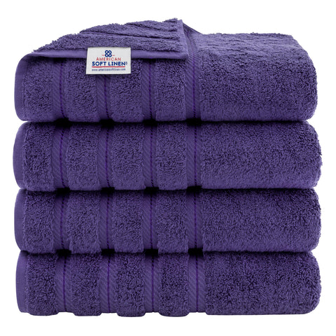 American Soft Linen luxury 4-piece bath towel set on display, 27x54 inches, ultra-absorbent.