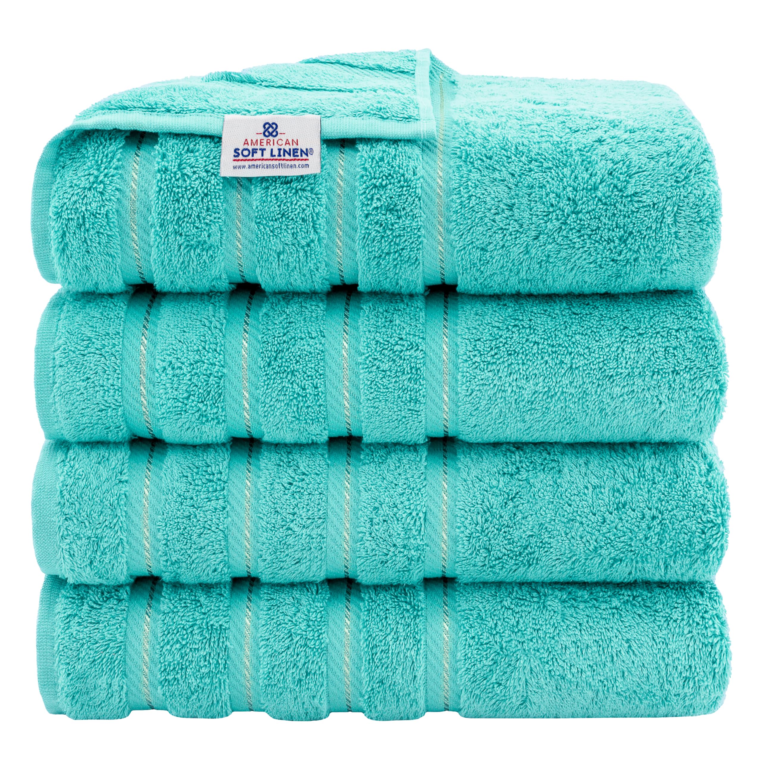 American Soft Linen luxury towels in turquoise four-piece set with plush, absorbent 600 GSM fabric.