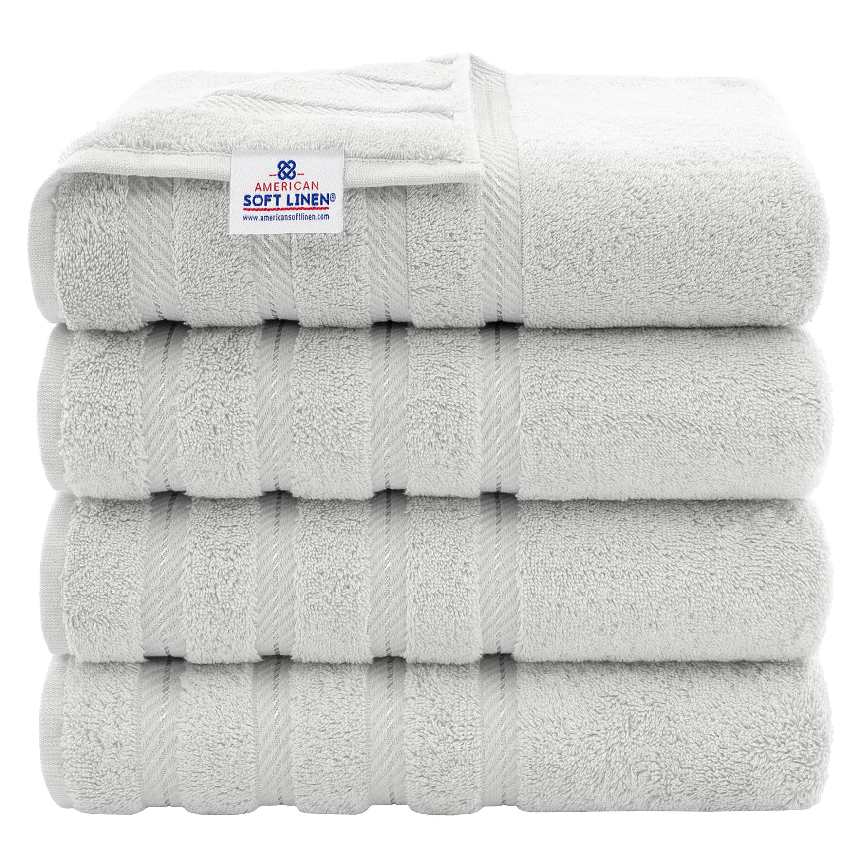 American Soft Linen luxury four-piece towel set on a rack for everyday softness.