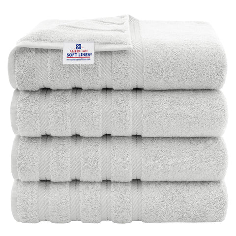 American Soft Linen luxury four-piece towel set on a rack for everyday softness.
