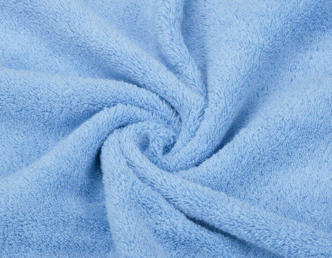 Sky blue towels hung in bathroom display by American Soft Linen
