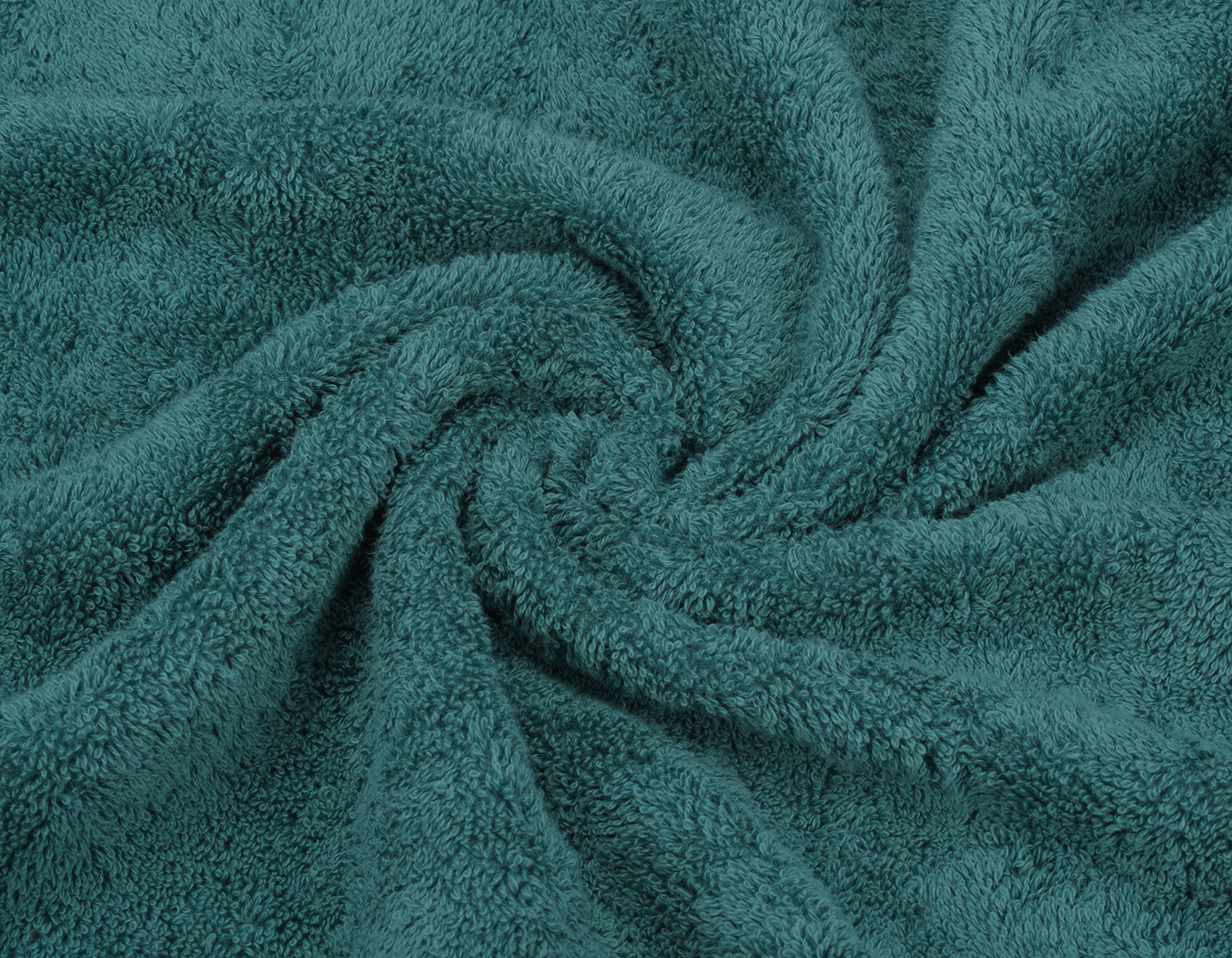 American Soft Linen teal folded towels ready for display
