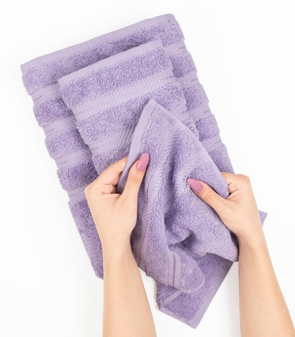 Towels draped on rack; vibrant color and absorbent surface