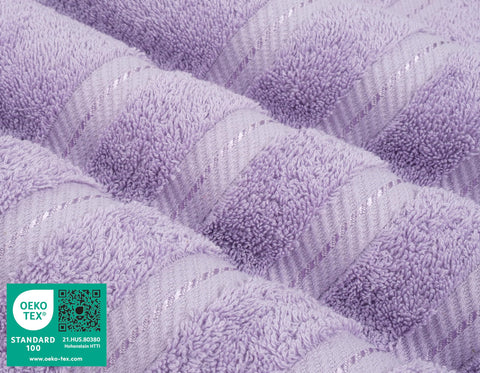Close-up of lilac towel texture; premium Turkish cotton feel