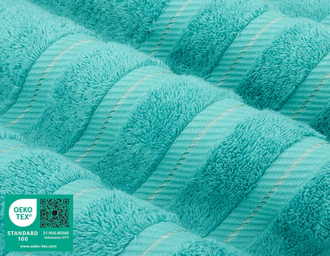 Turquoise towel on rack ready for daily use.