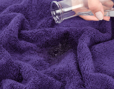American Soft Linen purple towels add elegant color to bathroom.