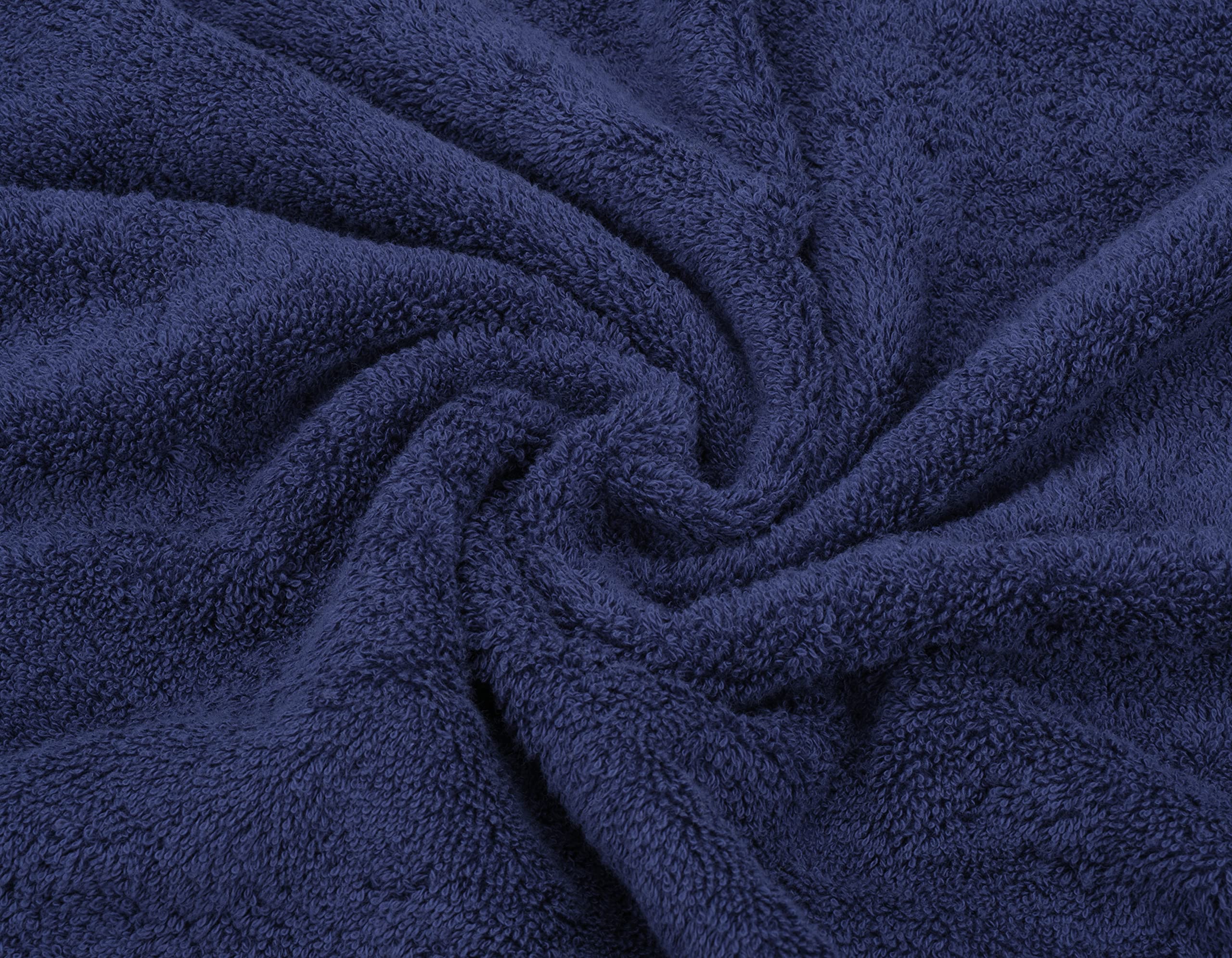 American Soft Linen spa-like bathroom scene with navy towels, calm atmosphere