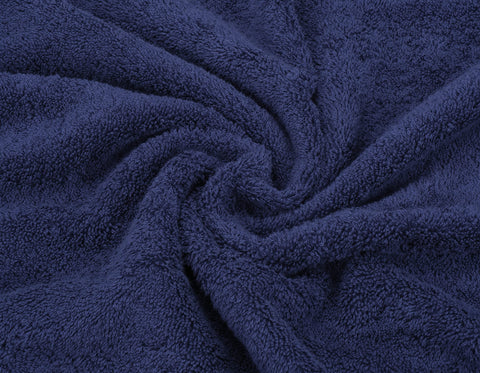 American Soft Linen spa-like bathroom scene with navy towels, calm atmosphere