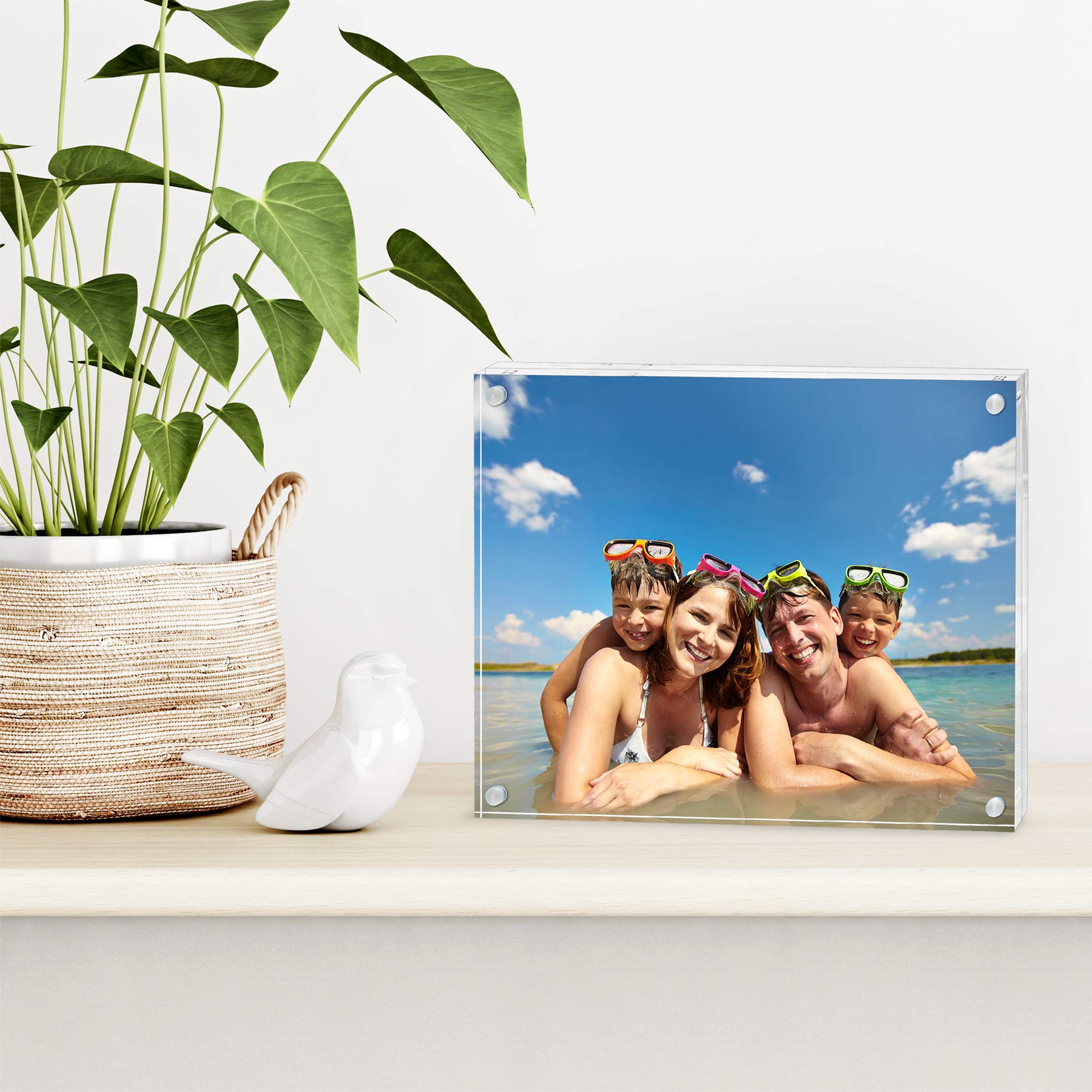 Americanflat borderless acrylic frame on a desk for a modern display