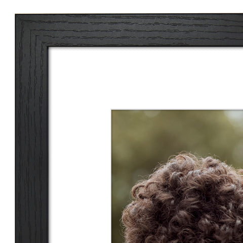Sturdy backboard keeps photos secure and flat