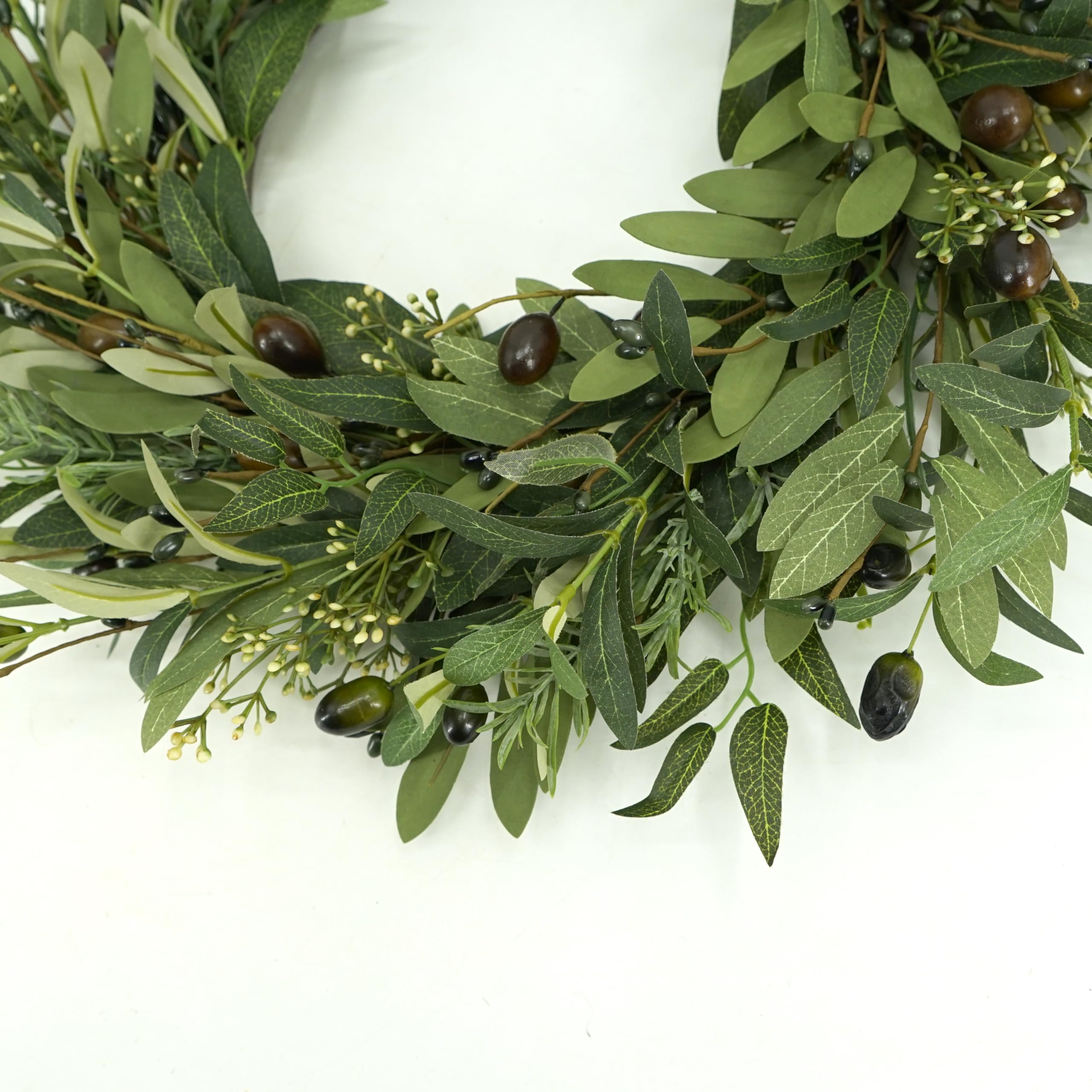 AMF0RESJ handcrafted olive wreath close-up emphasizing artisan detail.