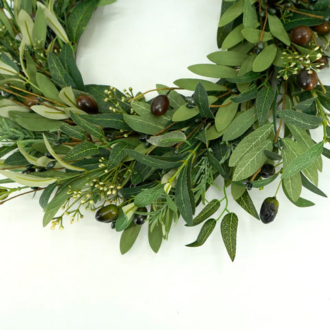AMF0RESJ handcrafted olive wreath close-up emphasizing artisan detail.