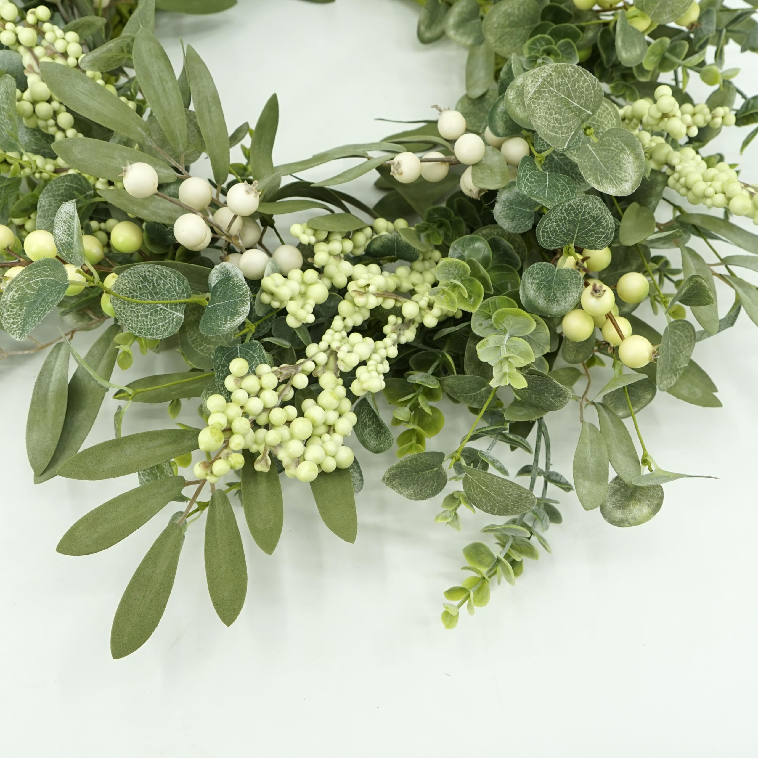 AMF0RESJ handmade wreath designed for indoor or outdoor display.