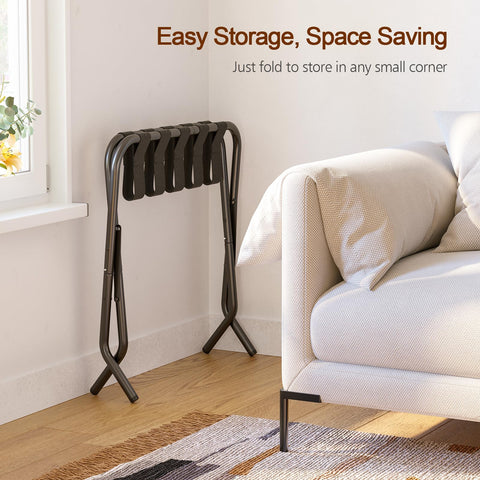 AMHANCIBLE luggage rack in use elevates a suitcase off the floor