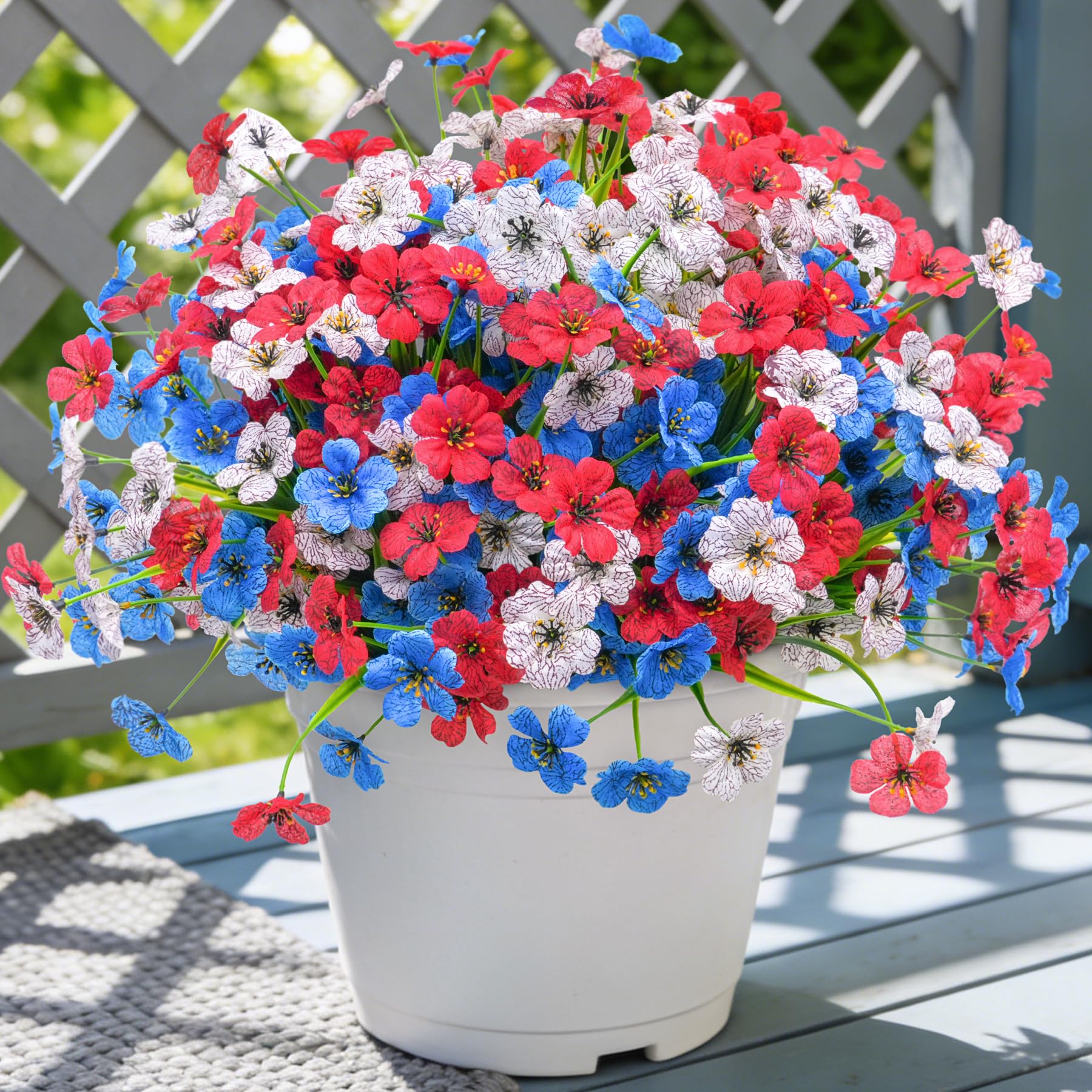 Ammyoo 16-pcs artificial flowers pack adds year-round color to interior and exterior spaces.