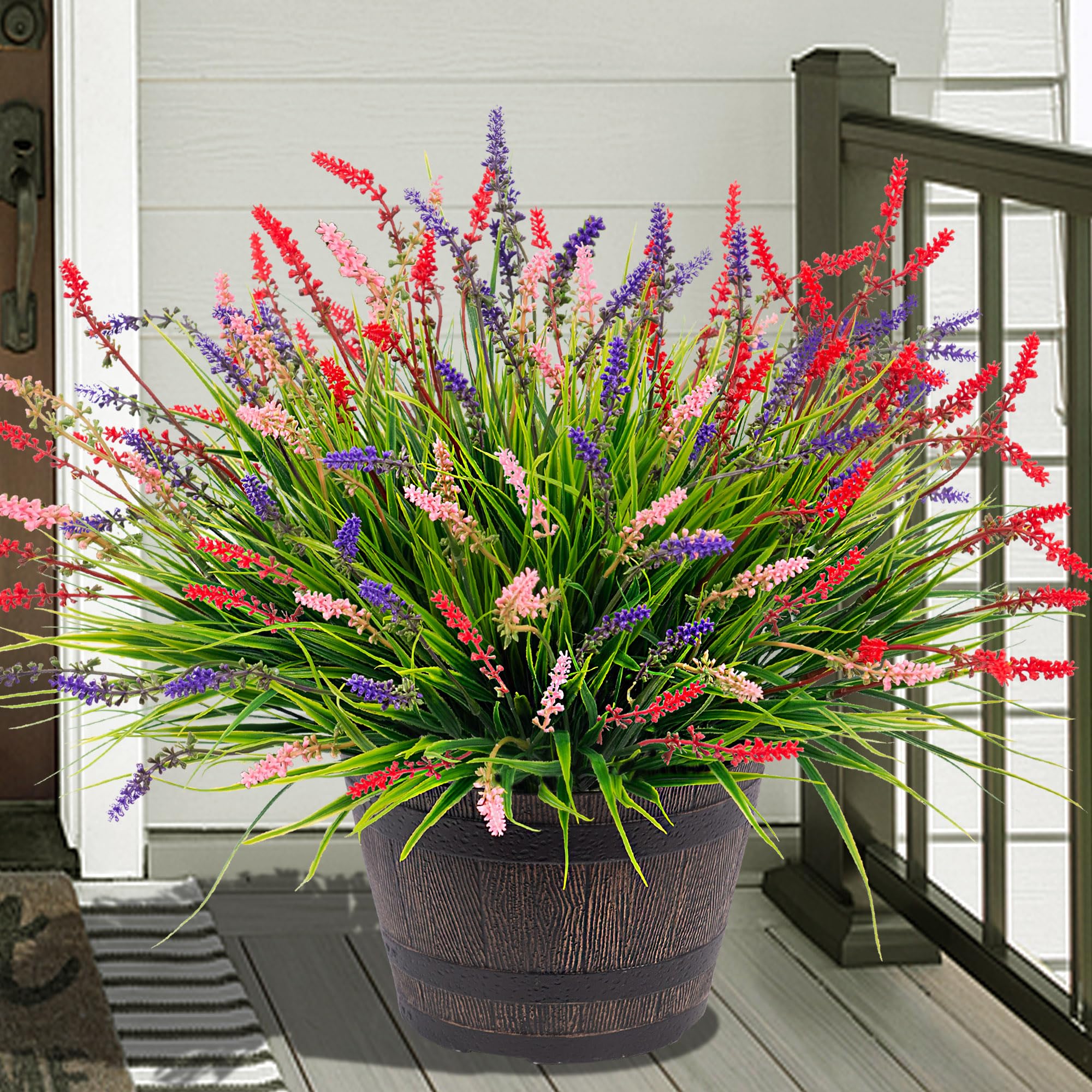 Ammyoo artificial monkey grass pack on porch for vibrant, UV-resistant outdoor decor.
