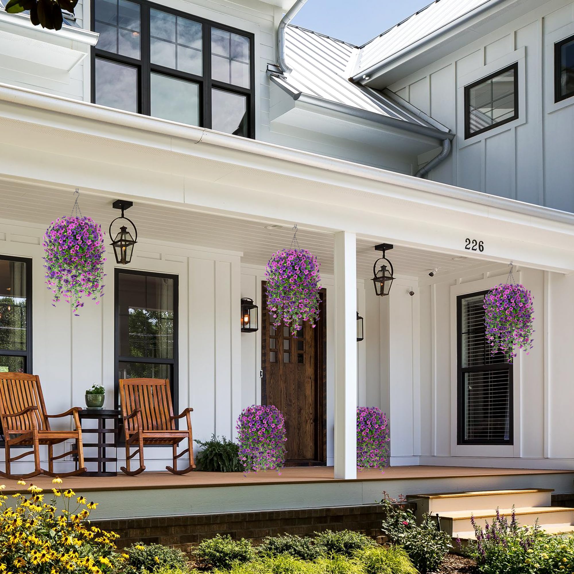 Ammyoo green eucalyptus leaves enhance the faux bloom display.
