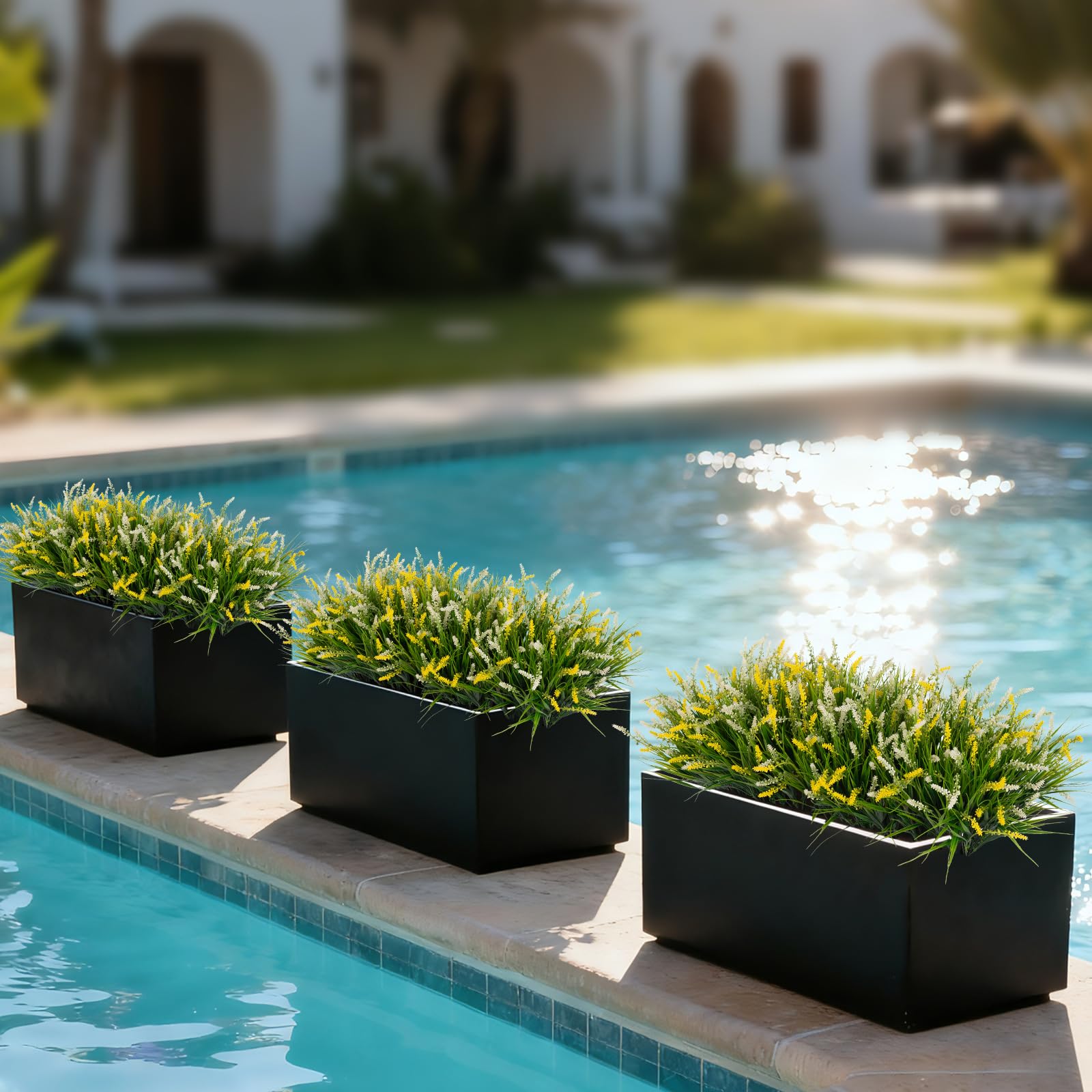 Ammyoo UV-resistant greenery withstands sun on front porch without fading.