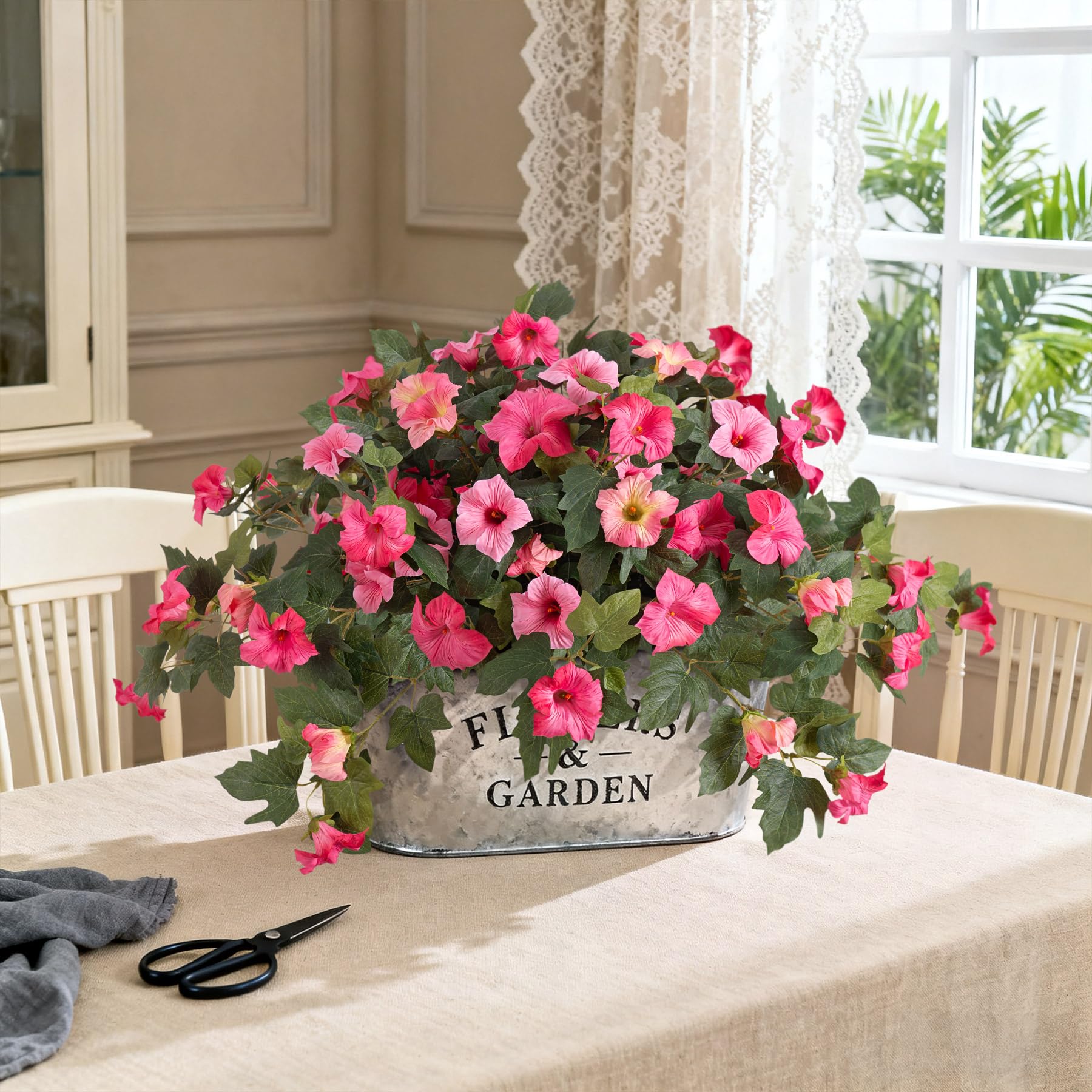 Ammyoo Petunia front-door display welcomes guests with color.