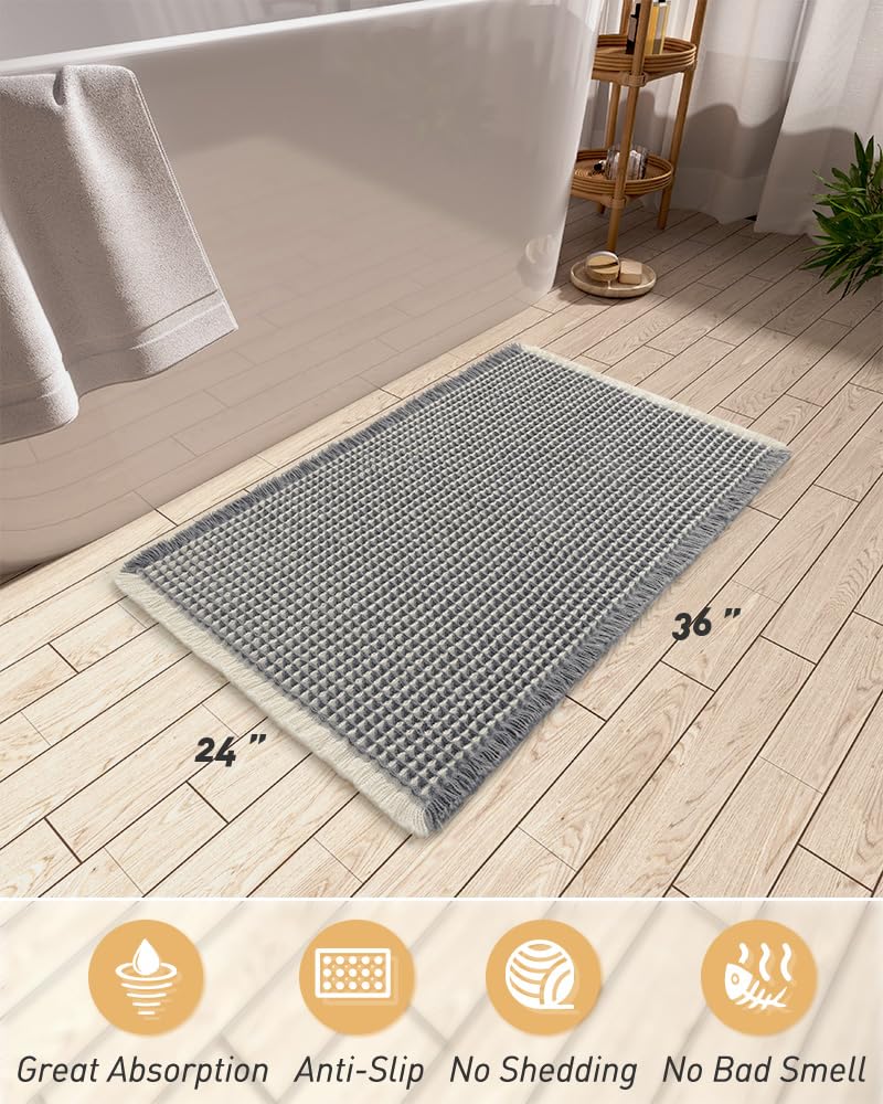 AMOAMI waffle bath mat care tag highlights machine washable design.