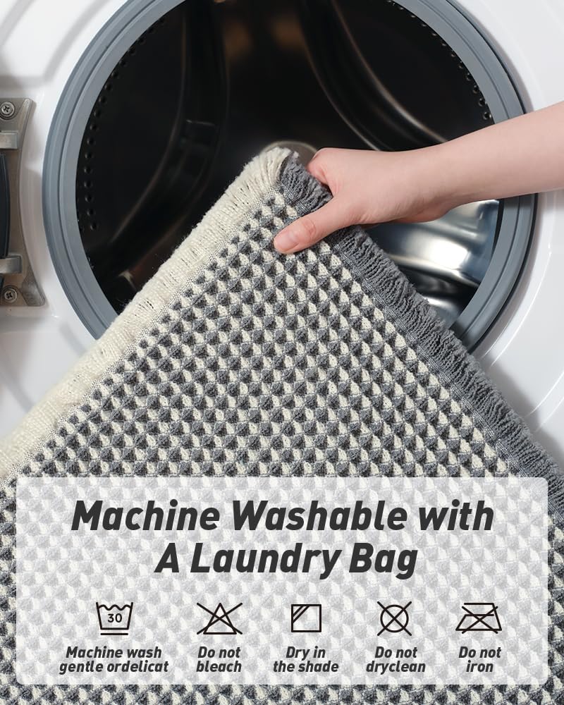AMOAMI waffle bath mat tassels detail showcases decorative edge charm.