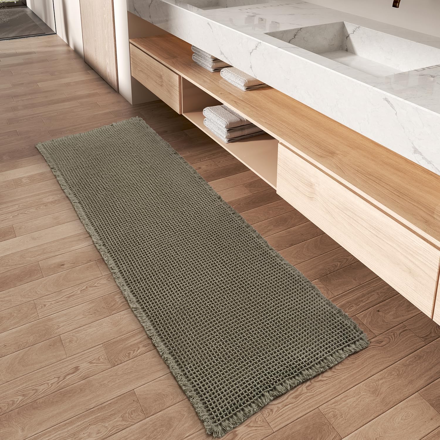 AMOAMI Upgraded Waffle Runner Rug with absorbent texture helping keep floors dry.