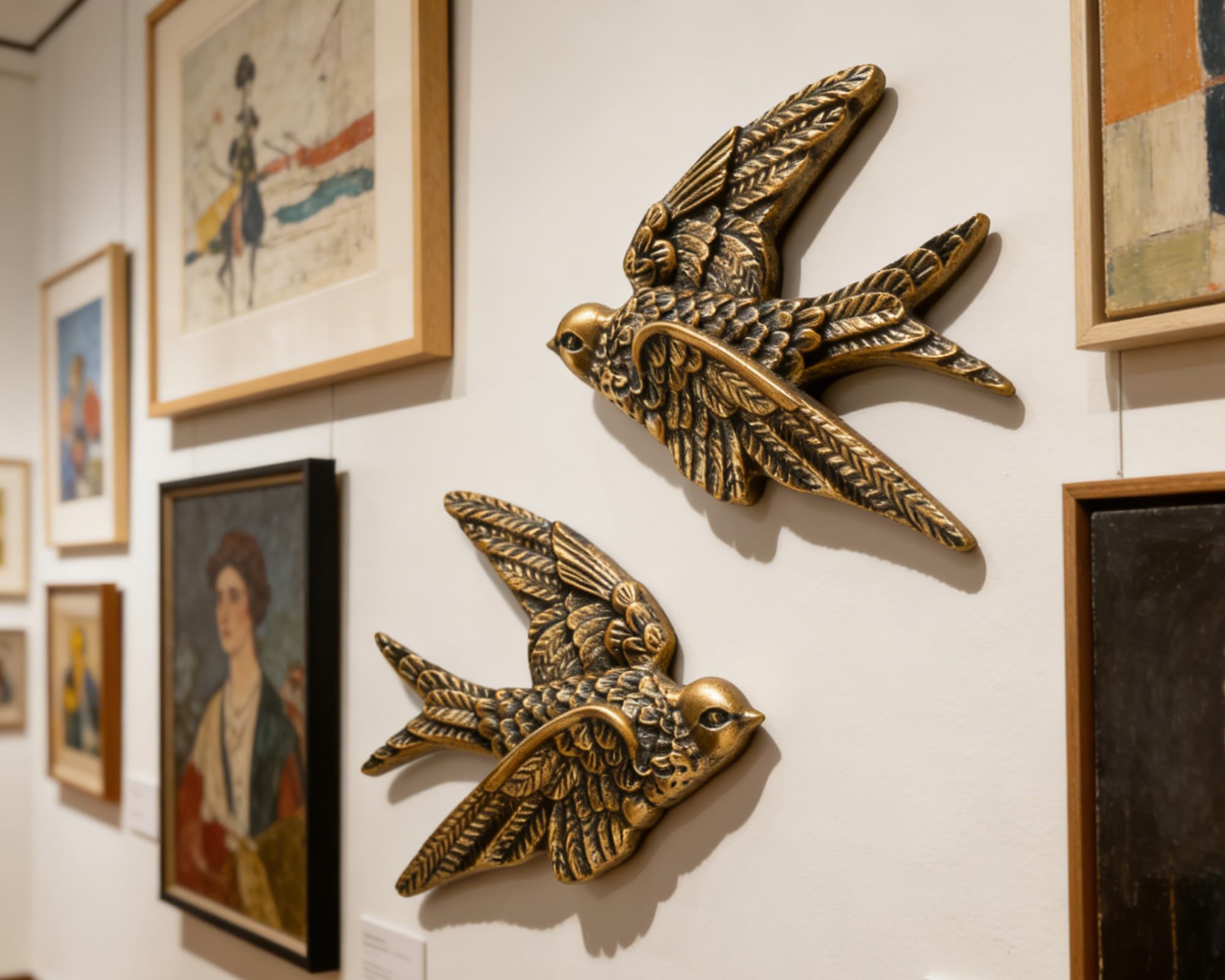AMOIENSIS resin art with antique gold finish enhances gallery wall ambiance.