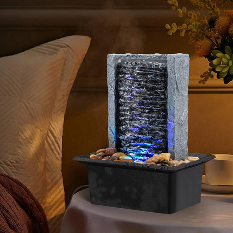 AMOOTEK Tabletop Fountain measures 6.3 x 5.12 x 8.66 inches