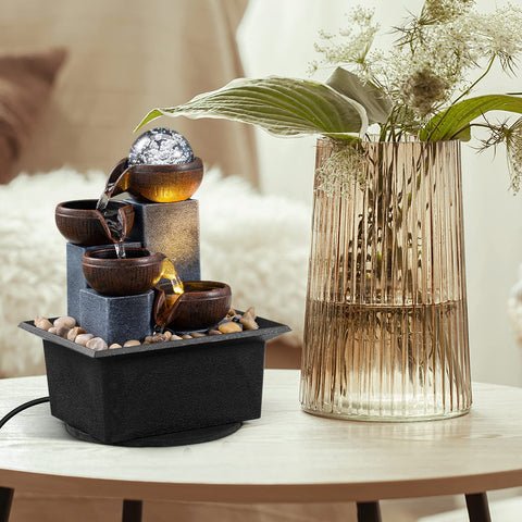 AMOOTEK fountain LED lights create a soft nighttime illumination.