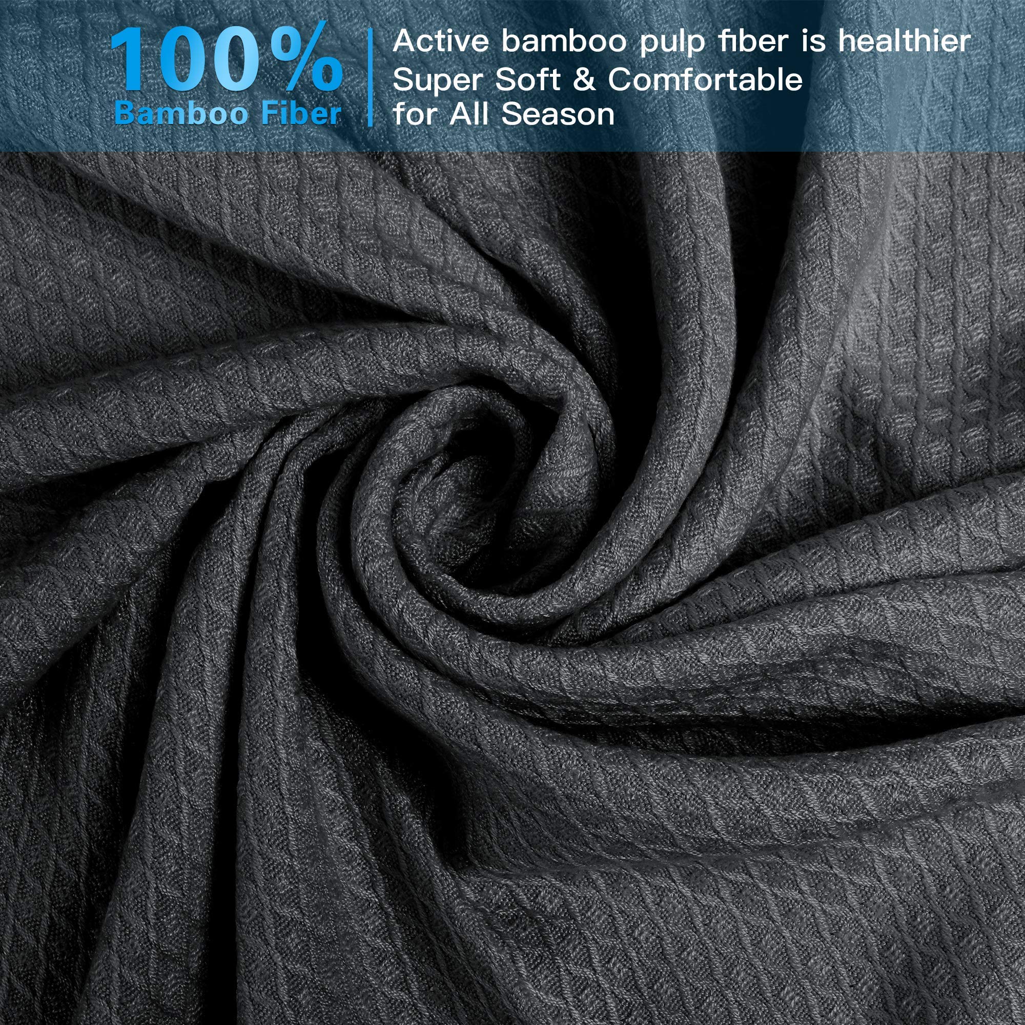 AmyHomie blanket on bed demonstrates drape and lightweight comfort for all seasons.