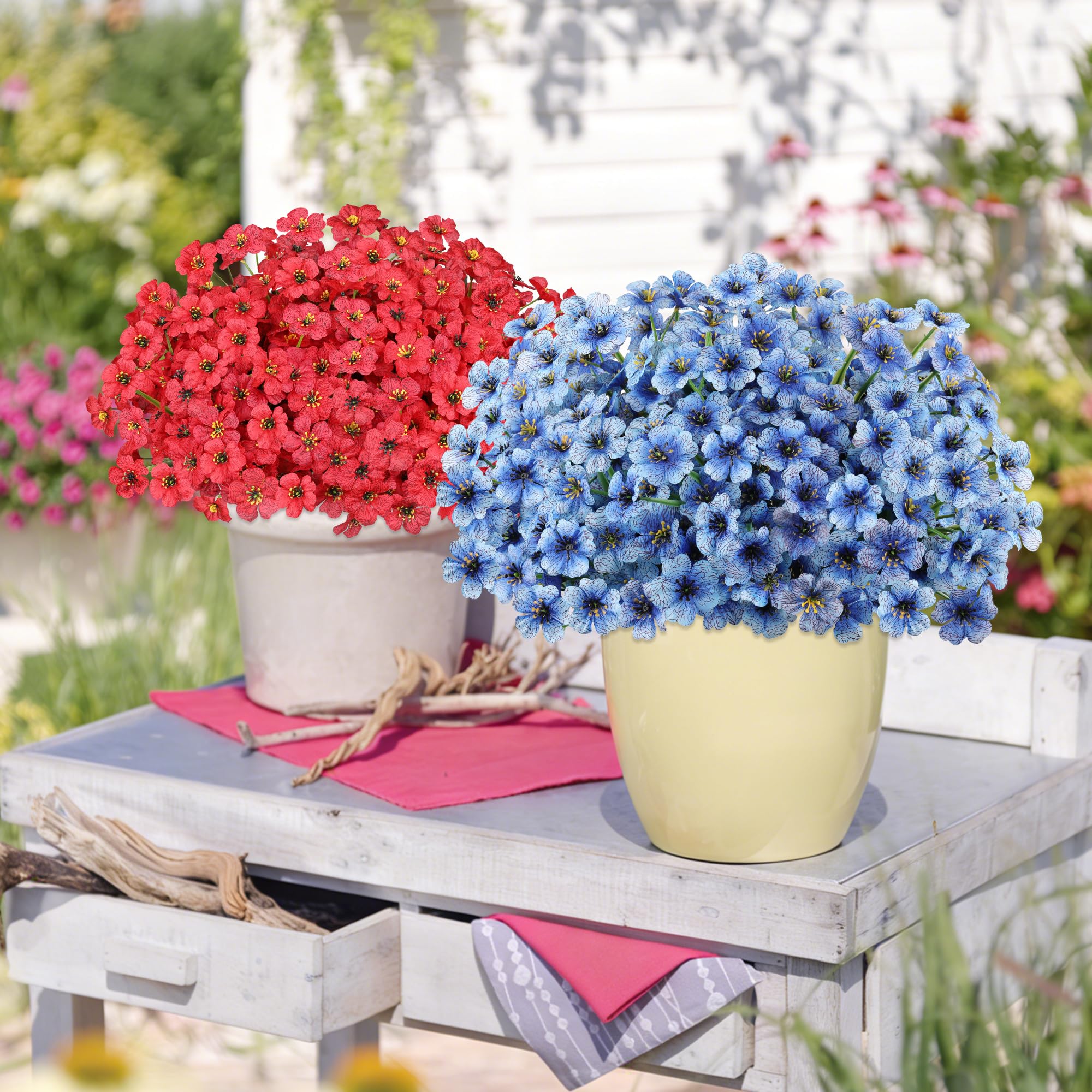 AmyHomie blue artificial flowers placed in a planter for easy setup