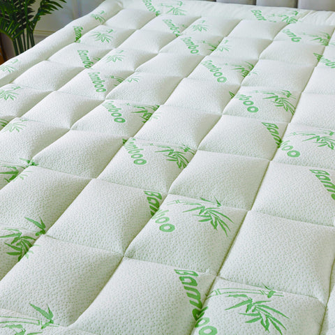 ANALIN bamboo topper adds a soft, inviting look to your bedroom setup.