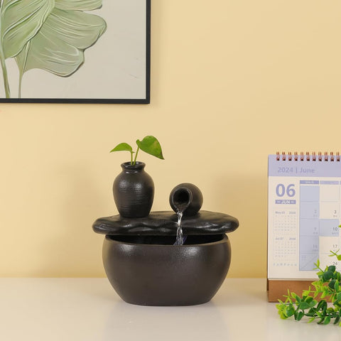andady ceramic tabletop fountain with black finish suits contemporary spaces
