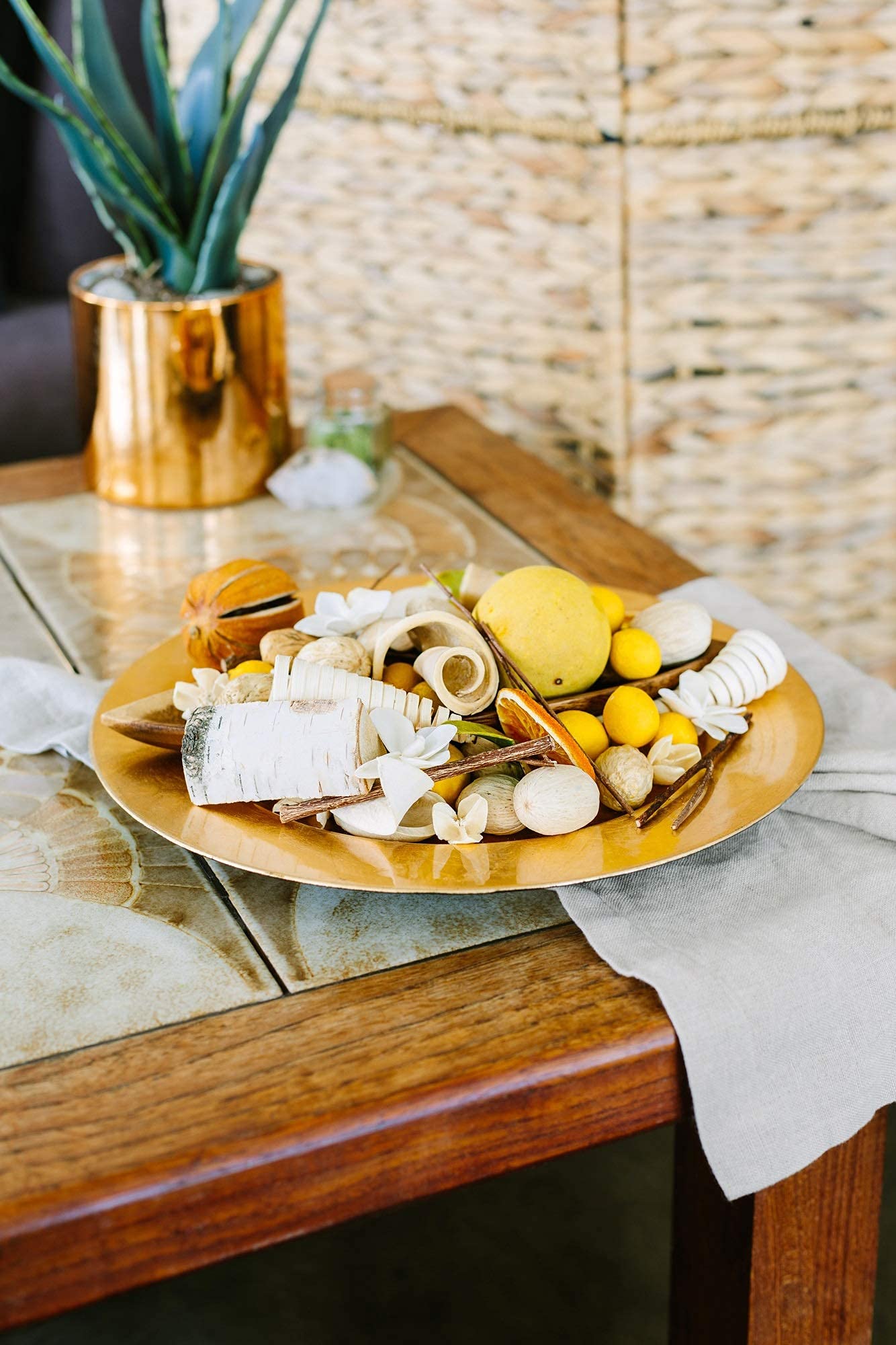 ANDALUCA potpourri in a wood bowl forms a stylish tabletop centerpiece.