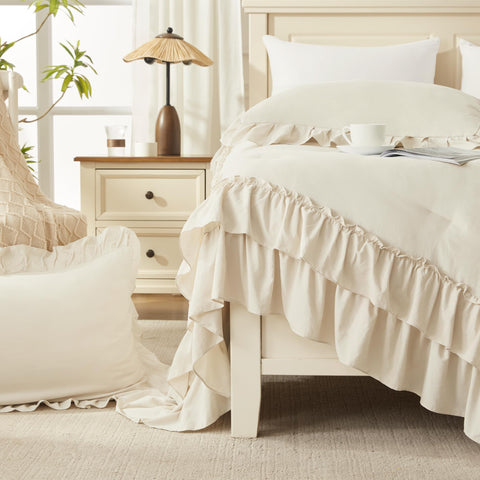 Andency Beige Queen Comforter Set arranged on a bed to showcase styling.