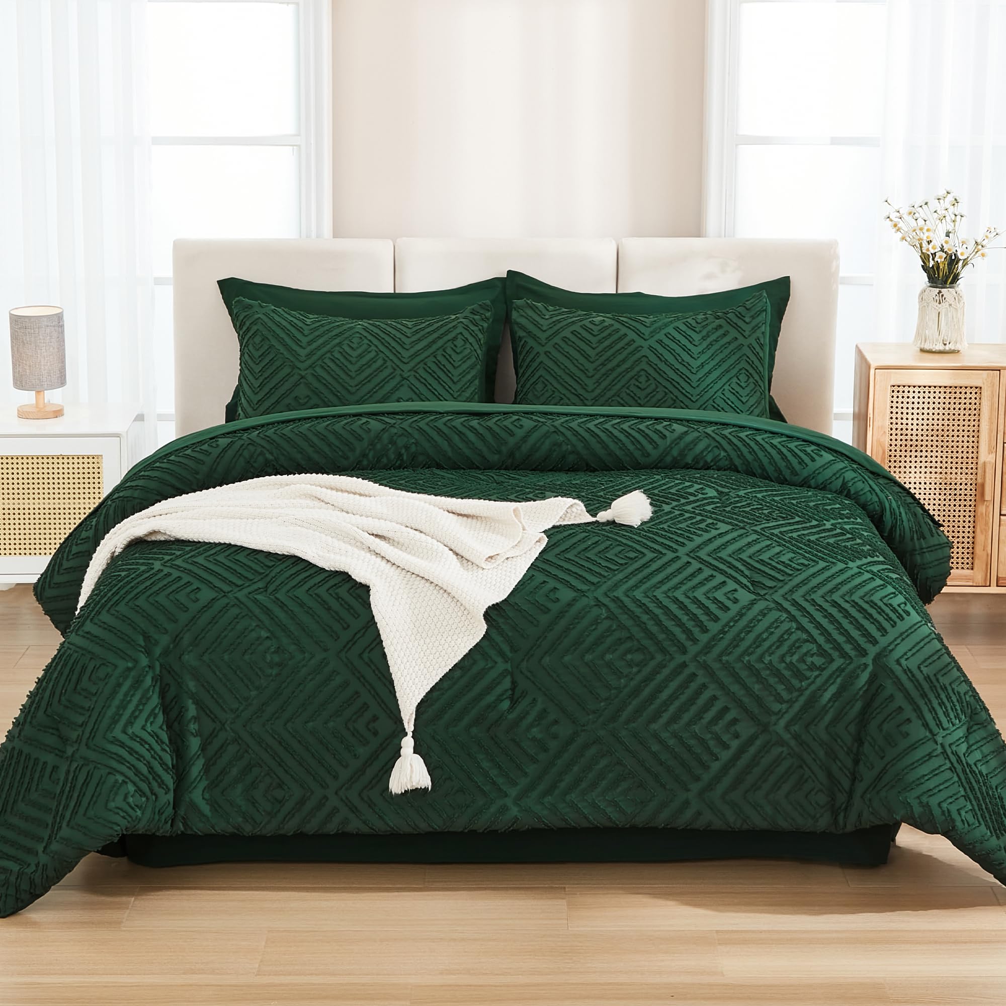 Andency fitted sheet with 14-inch deep pocket secures the king mattress.