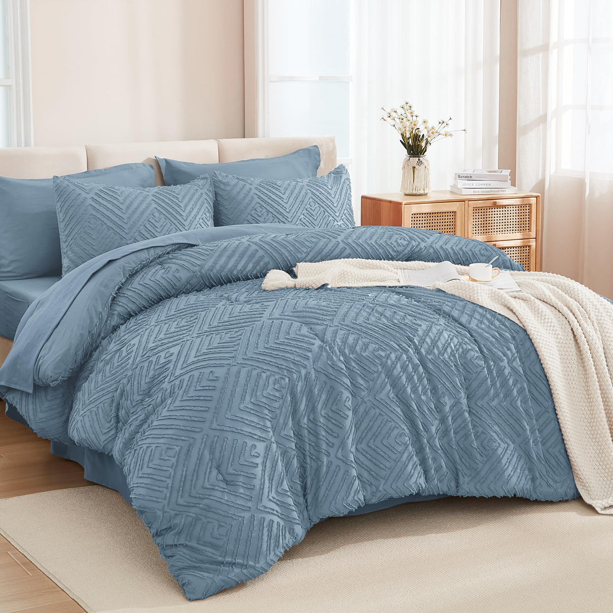 Andency king size comforter set in grayish blue offers a chic bed-in-a-bag look for any bedroom.
