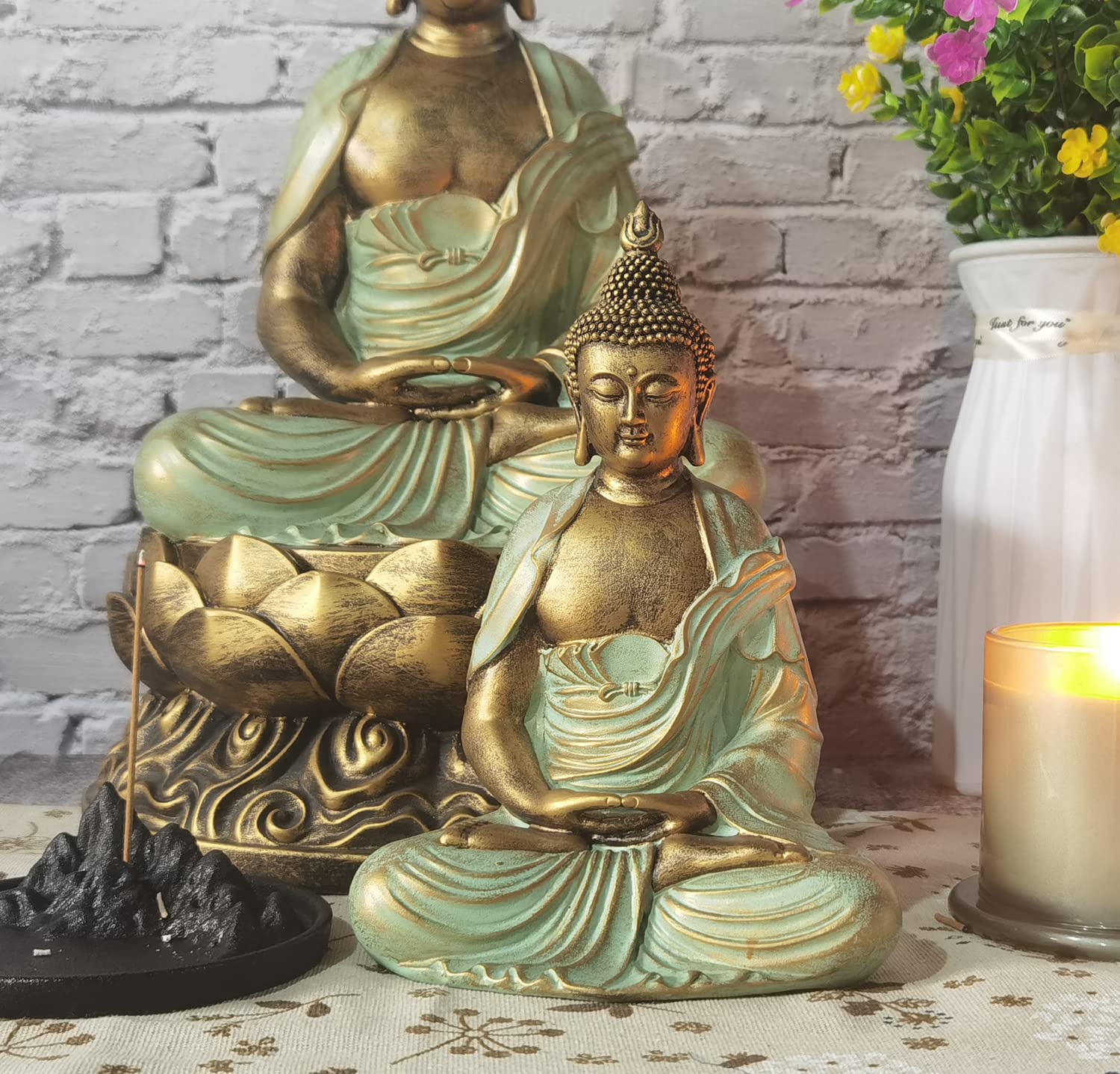 Angel Shine gold Buddha statue on shelves creates a focal point in any room.