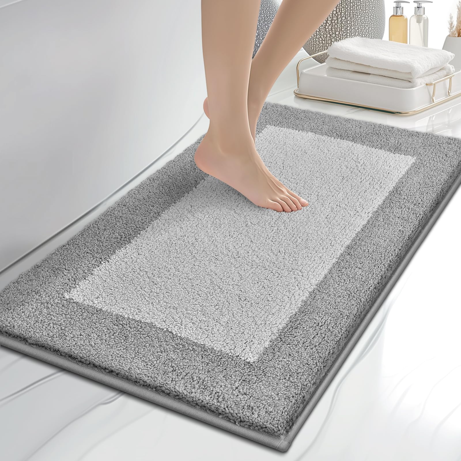 Anllugs bathroom rug with plush surface for soft, cozy feet.