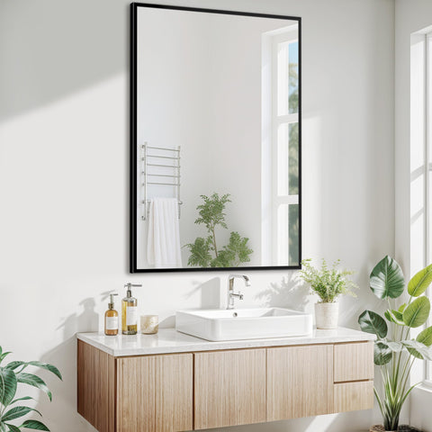 Antok 24x36 black metal framed mirror with straight-edge for a modern bathroom look.