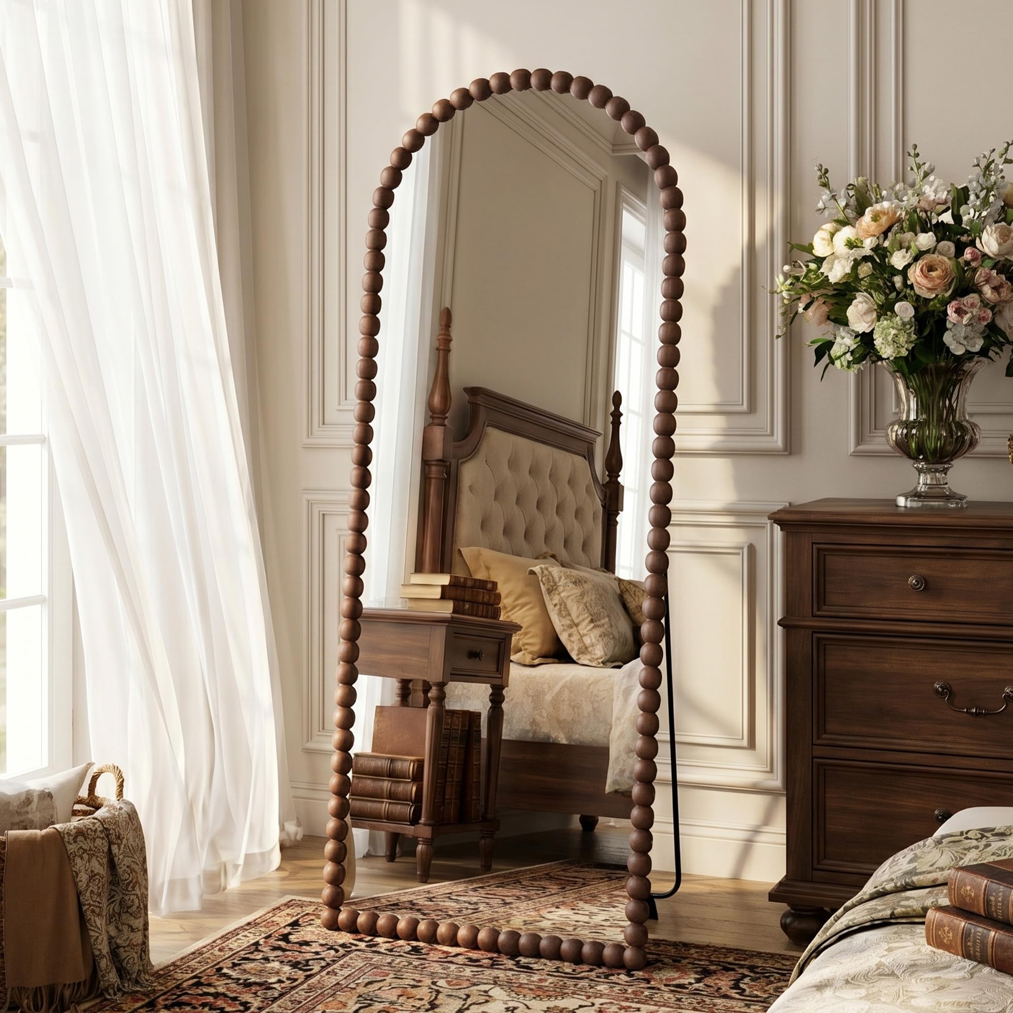 Antok arched full-length mirror in floor-standing design for outfit checks.